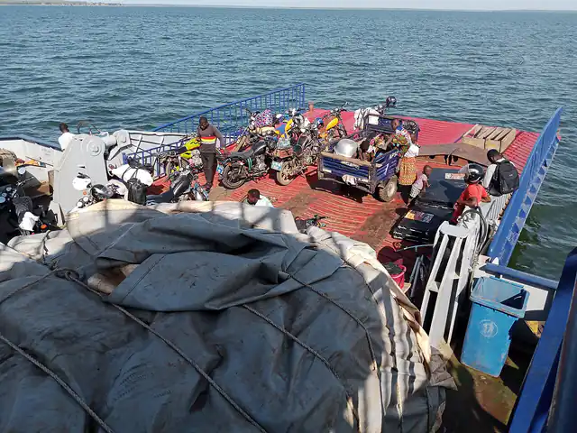 A ferry carrying passengers and vehicles on Volta Lake at Kete-Krachi
