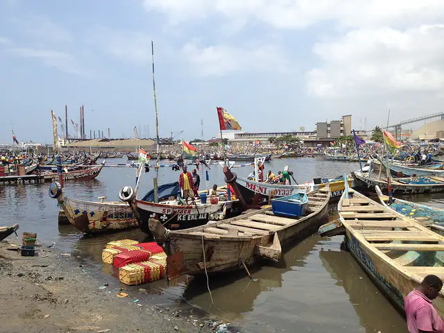 Traditional fishermen coming in to Tema harbour